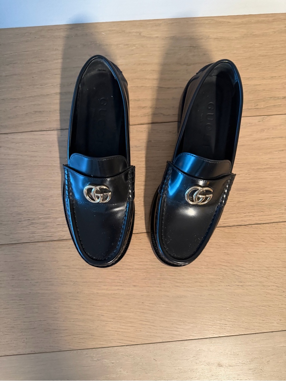 Gucci Black Leather Loafers with Gold GG Emblem